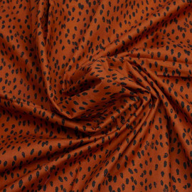 Tissu coton burnt orange à motif pois irrégulier et délavé noir| Pretty Mercerie | Mercerie en ligne