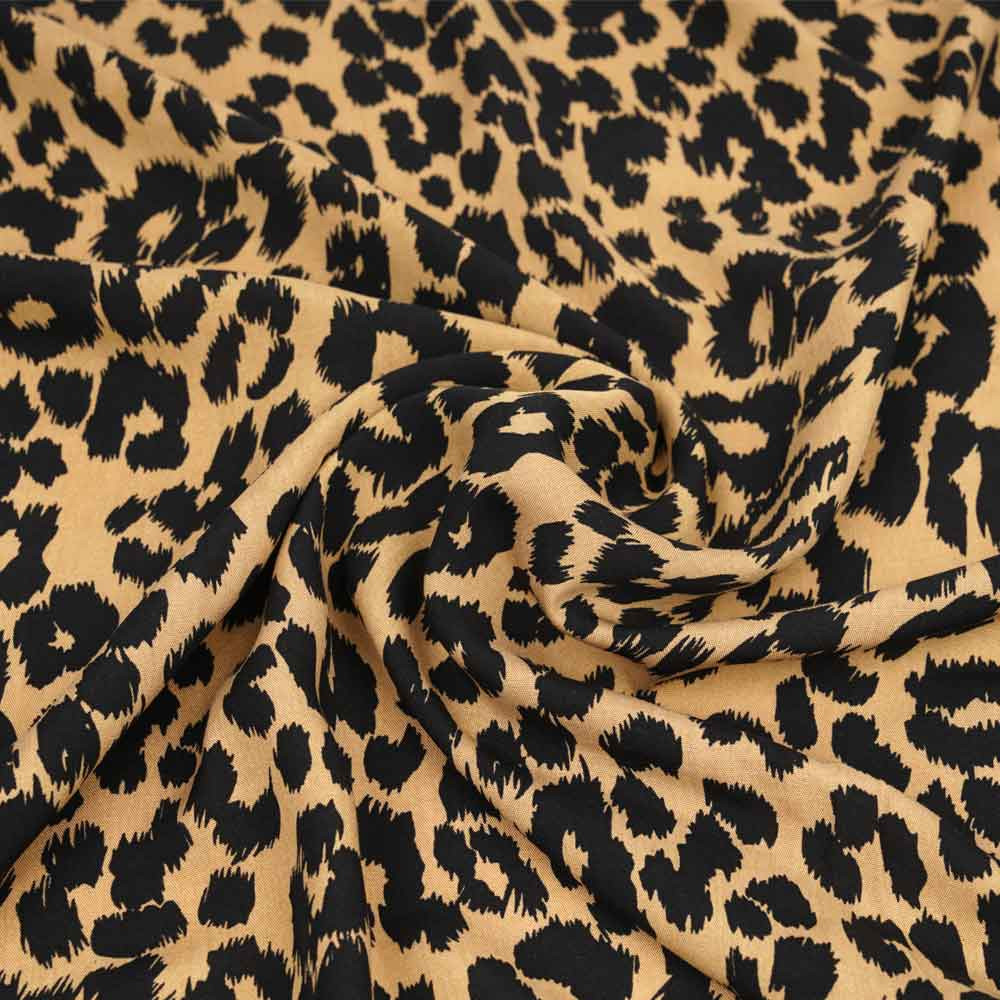 Tissu viscose beige à motif léopard noir | Pretty Mercerie | Mercerie en ligne