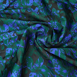 Tissu jacquard noir à motif fleur orchidée vert et bleu