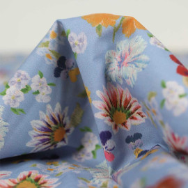 Tissu coton Dana bleu lavande à motif flower power multicolor