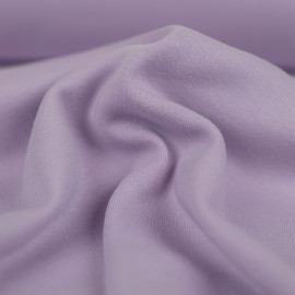 Tissu jersey maille tricoté de coton uni peigné - mauve