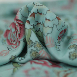 Tissu viscose Nathy bleu à motif floral rose et vert