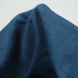 Tissu denim tricoté de coton stretch - bleu brut