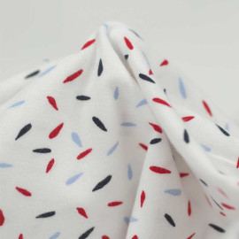 Tissu jersey de coton blanc à motif pépin noir, rouge et bleu ciel