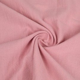 Tissu coton brut lavé effet vintage uni - rose pastel